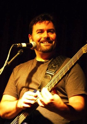 Seth Horan with bass guitar